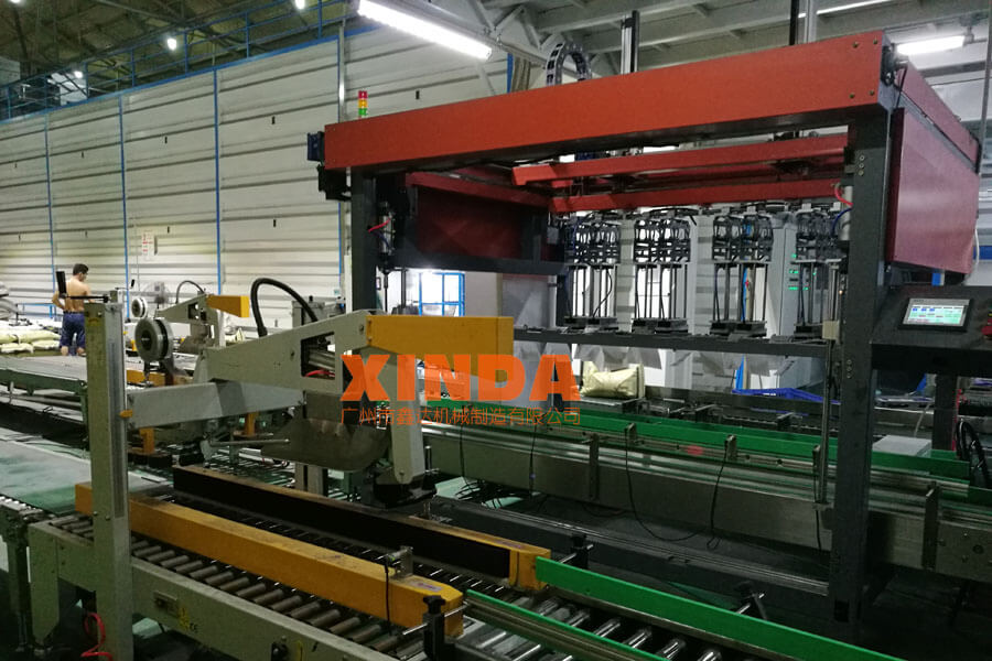 大米使用全自動(dòng)裝箱機(jī)案例-鑫達(dá)機(jī)械